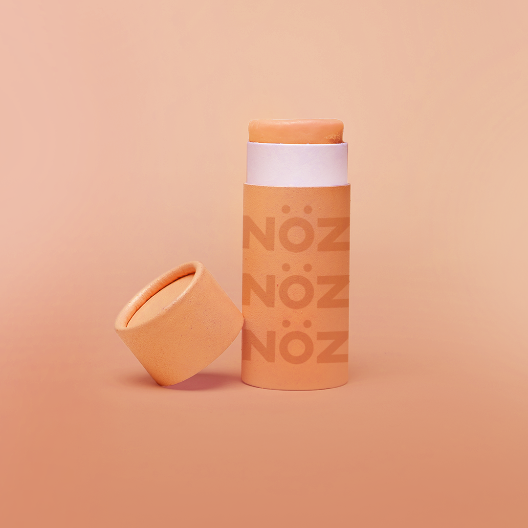 Noz vegan and reef safe sunscreen in the color orange.